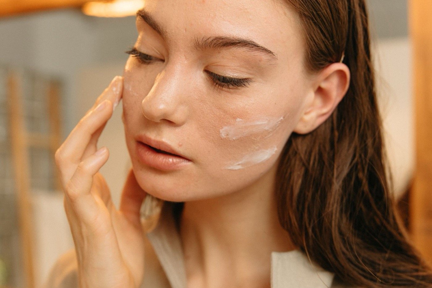 A gentle brightening cream applied and smoothed onto the skin at Plum & Sugar
